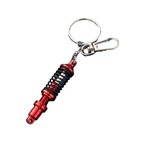 BRELOK SAMOCHODOWY AMORTYZATOR BRELOCZEK PREZENT DLA KIEROWCY CHŁOPAKA MĘŻA